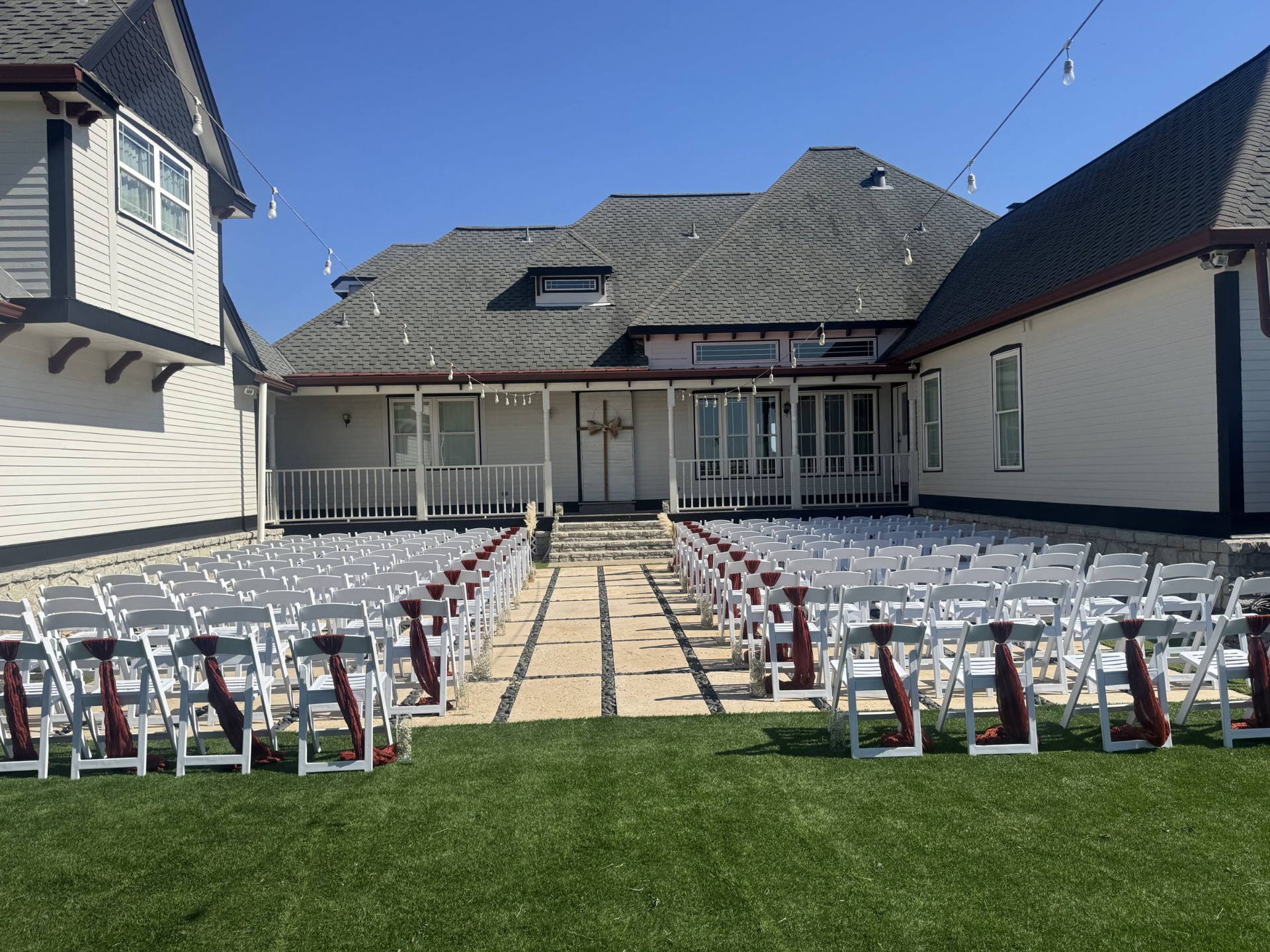 Courtyard wedding setup with purple decor at Moonshadow Ranch