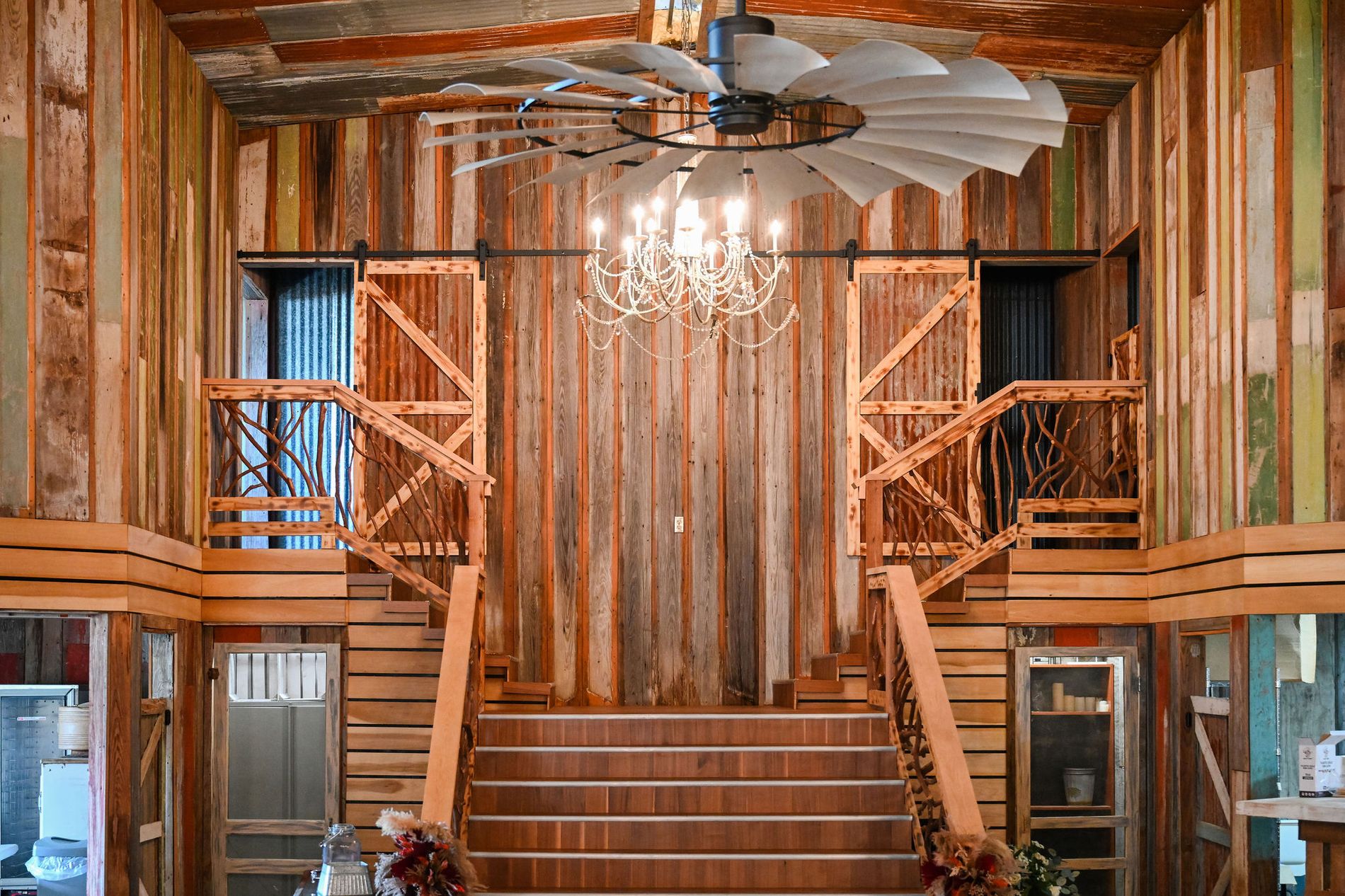 The barn under the chandeliers and the windmill fan